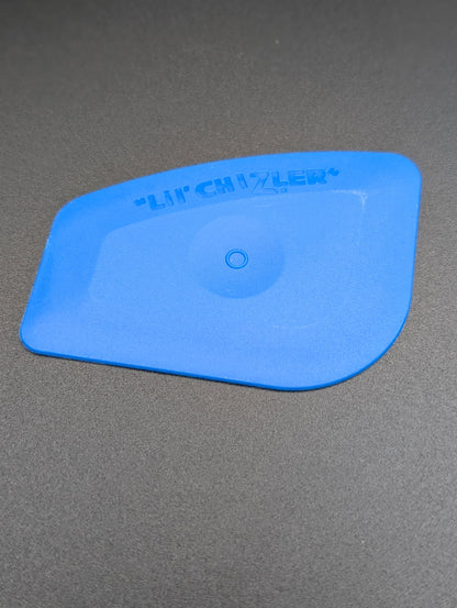 Raclett . Chizler . Blue . Orange